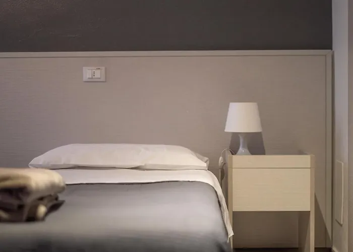 Luogo Comune Хостел Брешия